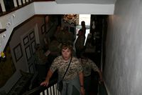 Youth climbing the stairs to explore the "haunted" rooms