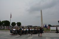 Band plays on next to Washington Monument