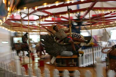 Cody Enjoys The Carousel Ride In The Pony Express Museum