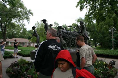Youth Getting A Closer Look At The Statuary At The Mormon Trail Center